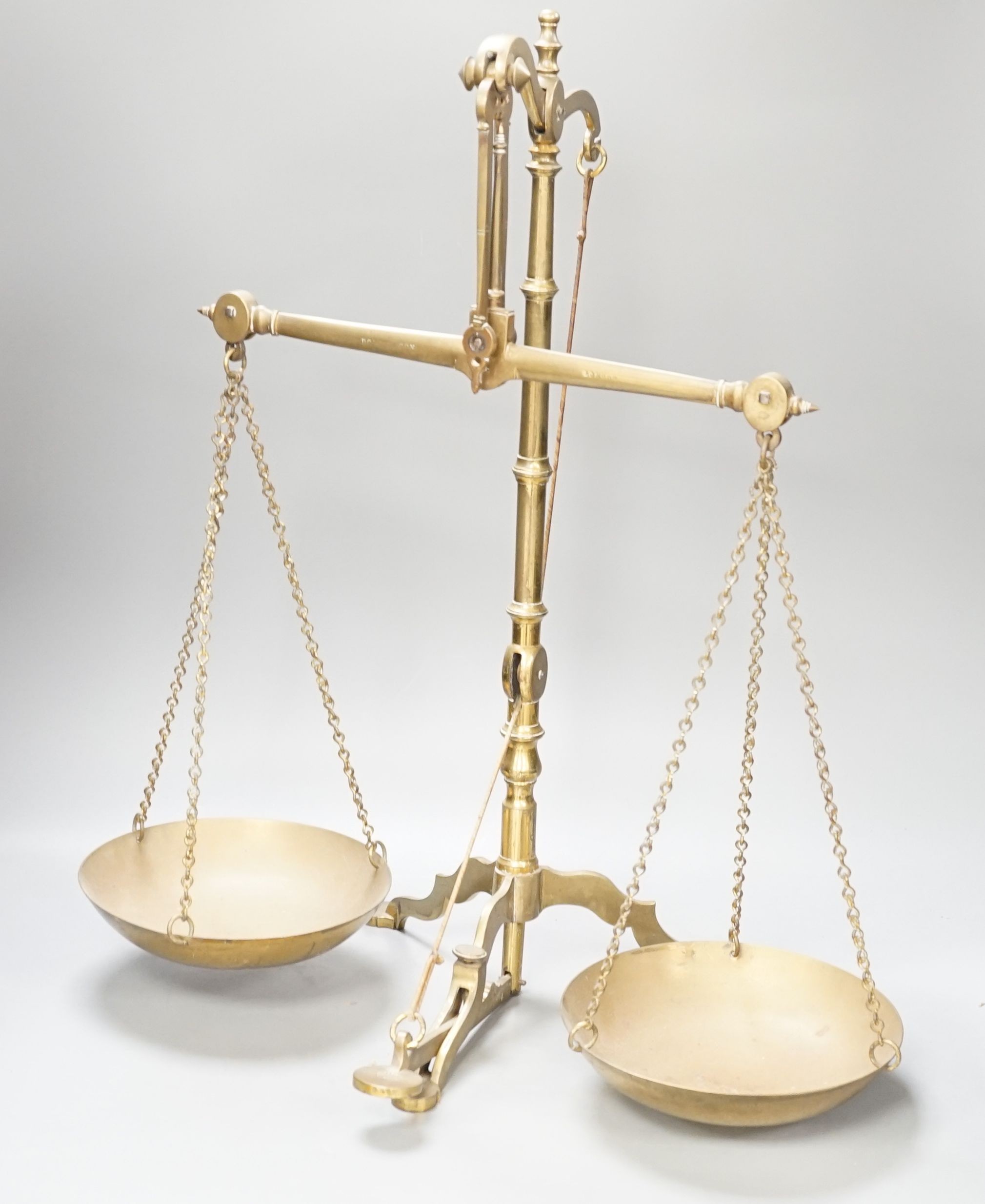 A Doyle & Son, London brass balance scale, 55cm. high